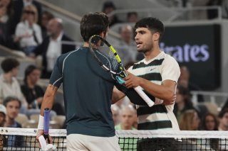 Carlos Alcaraz a battu un Lorenzo Musetti qui a dû jeter l'éponge au 4e set KEYSTONE/AP/Lindsey Wasson